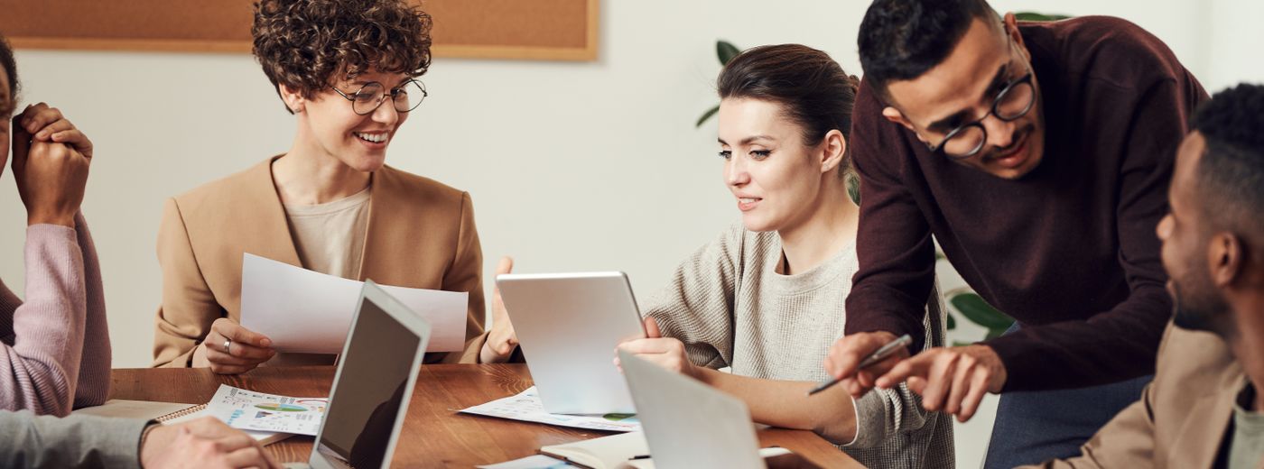 Diverse team collaborating in modern office